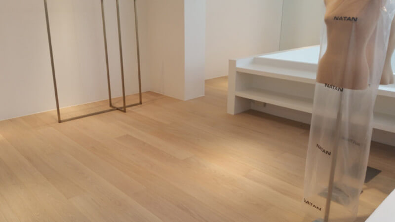 Clothing boutique features oak floors finished with Rubio Monocoat Oil Plus 2C.