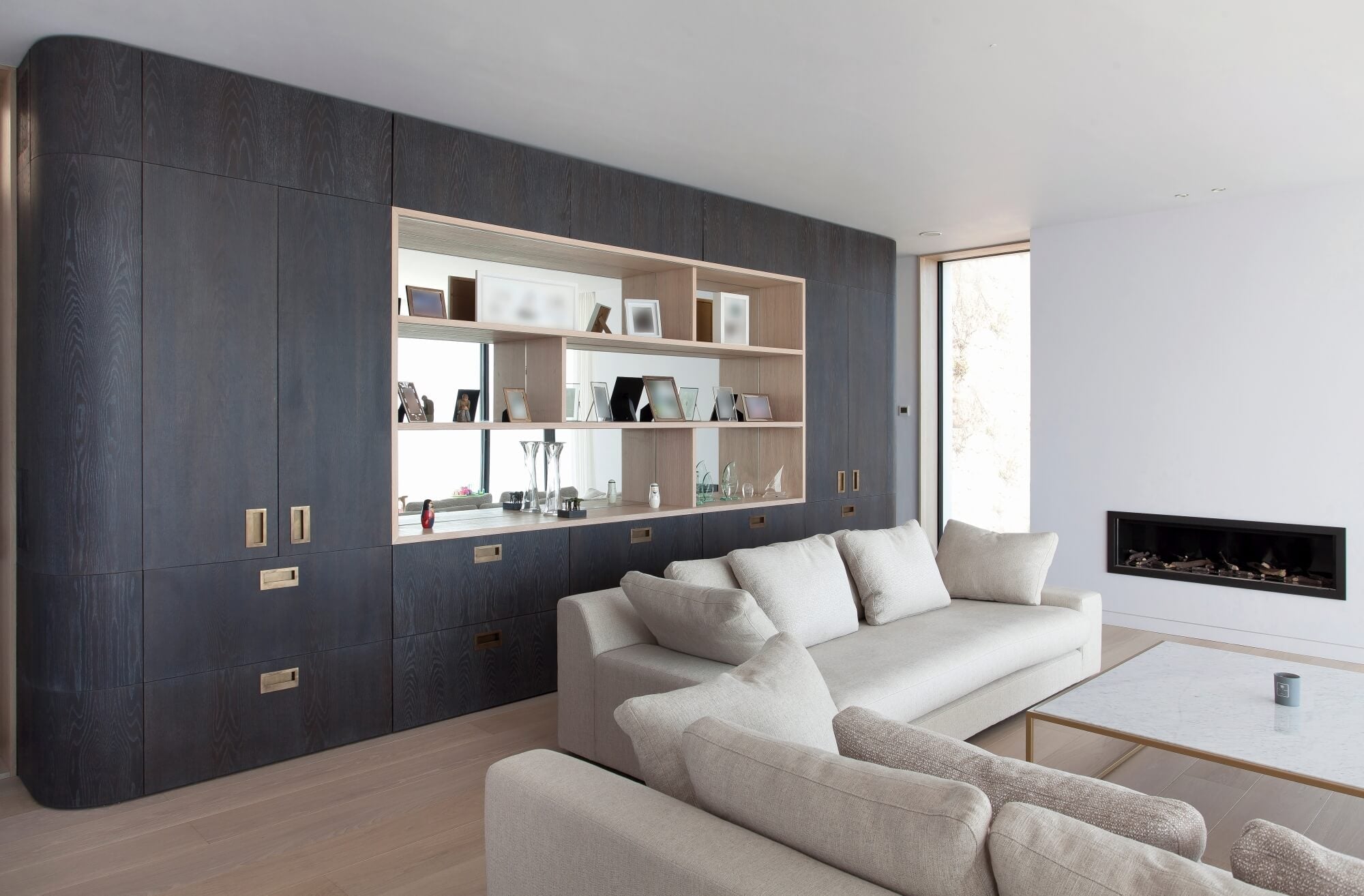 Built in wall cabinets stained dark using eco-friendly wood finish.