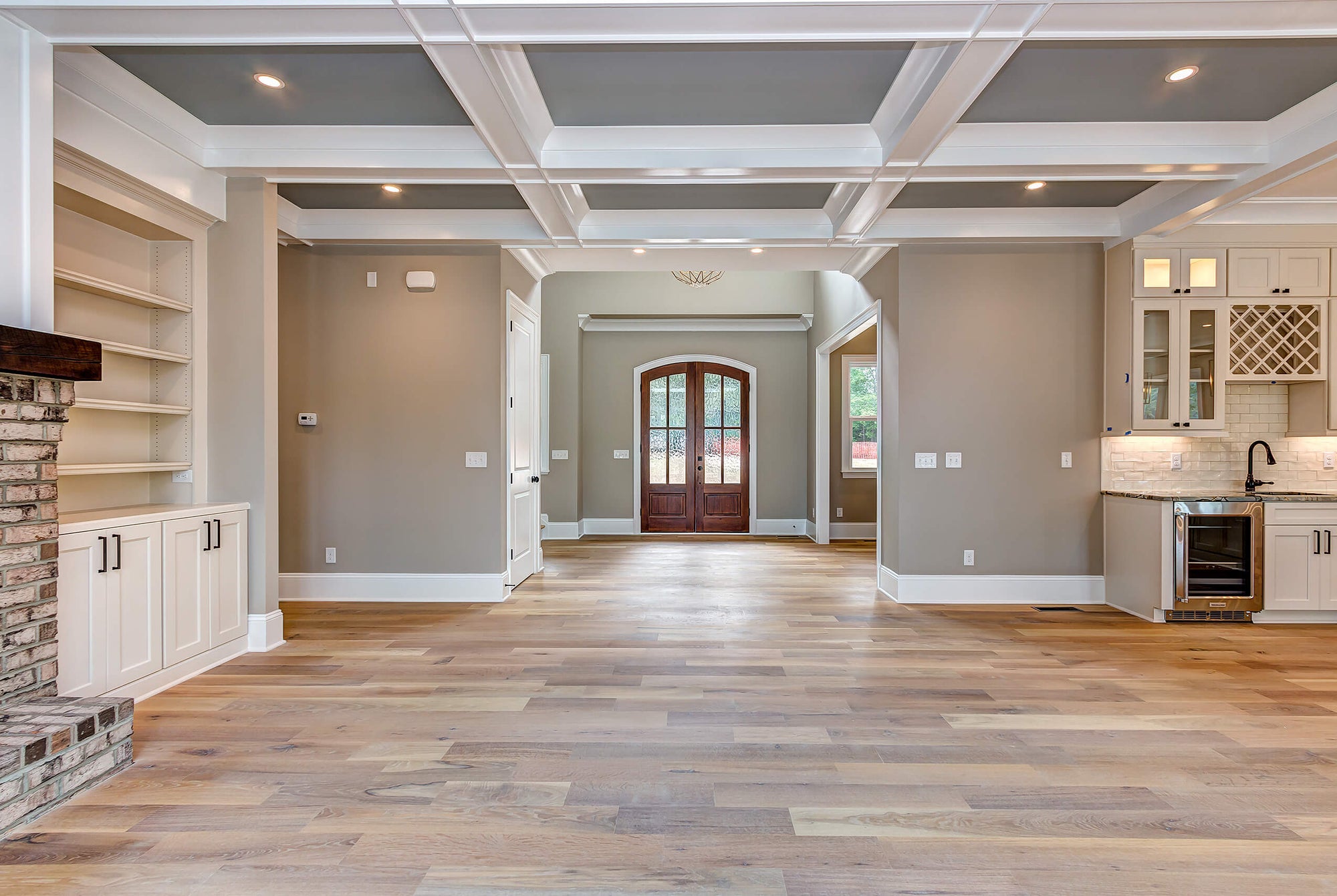 Beautiful entry way with engineered white oak floors finished with a hardwax oil finish from Rubio Monocoat.