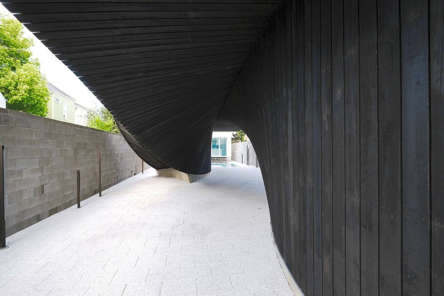 Exterior Shou Sugi Bahn wood siding on J-House in New Orleans.