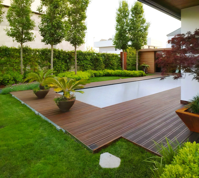 A bamboo pool deck finished with Rubio Monocoat DuroGrit exterior wood finish.