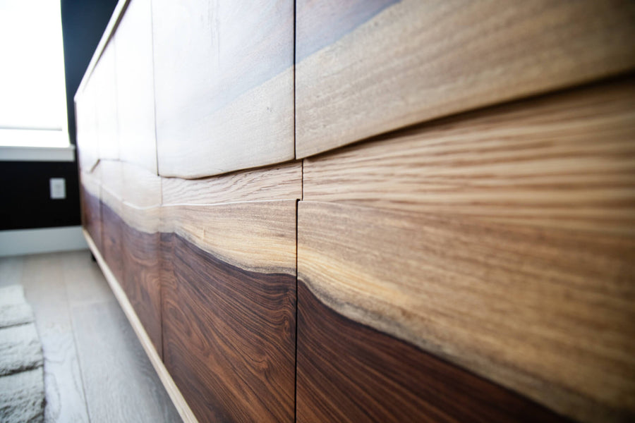 Detail shot of bolivian rosewood door fronts on a record storage console.