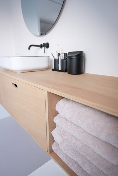 A floating bathroom vanity finished using Rubio Monocoat hardwax oil wood stain and finish in one. 