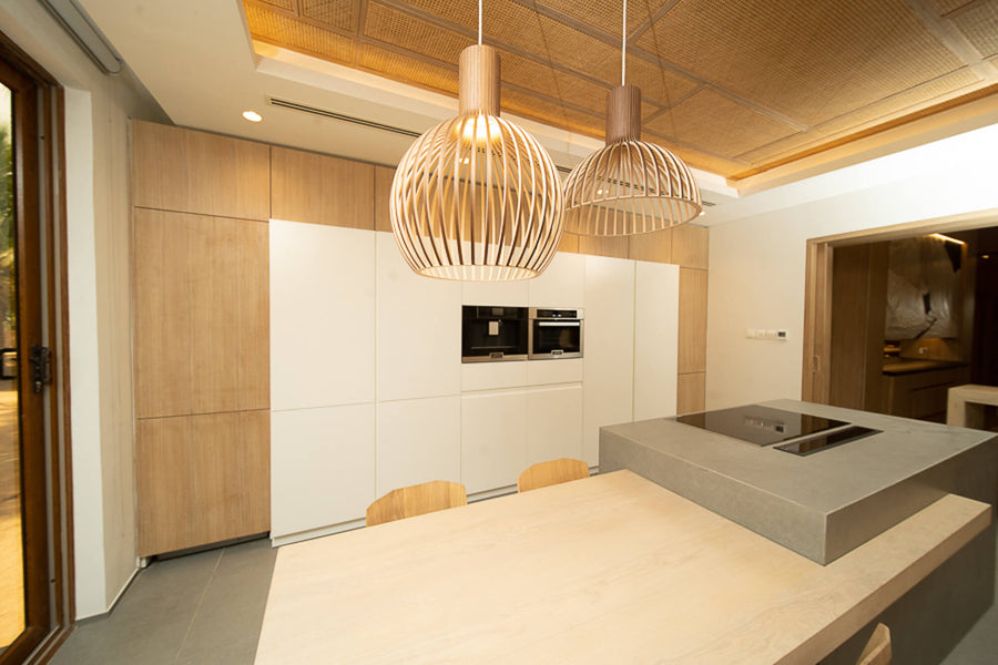 A custom kitchen with oak veneered cabinetry finished using Oil Plus 2C hardwax oil wood finish.