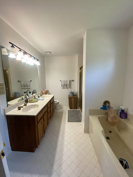 The before image of a dated bathroom that badly needed to be renovated for functionality and aesthetic.