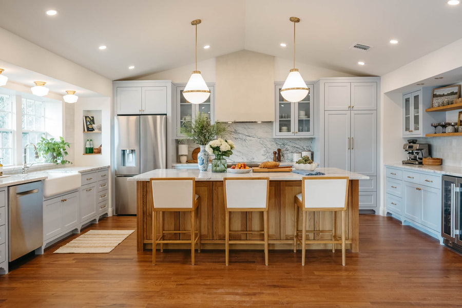 A modern kitchen with a white oak island finished using Rubio Monocoat Oil Plus 2C hardwax oil wood finish.